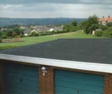 block of rubber flat roof garages